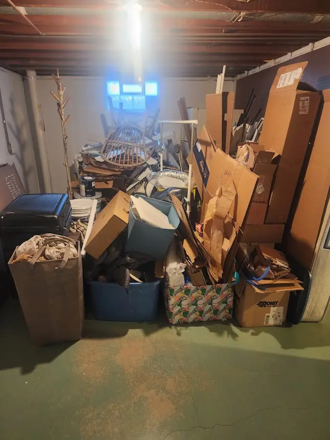 Roll-off dumpster container at job site for Roll Off Dumpster Rental in Woodbury